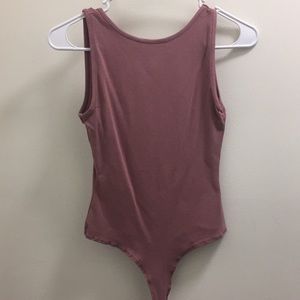 brand new bodysuit from fashion nova.